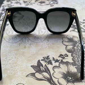 Beautiful Gucci Sunglasses. Worn once. Comes with purple case and lens cloth.